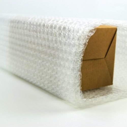 Bubbles covering the box by bubble wrap for protection product cracked white background